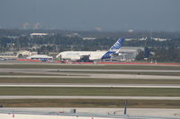 F-WWJB @ MCO - From across the field