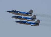 N104RD @ MCF - Starfighters Inc in formation