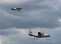 N551E @ YIP - Jack Roush's P-51B Old Crow flying with C-130