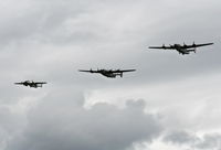 N224J @ YIP - Two B-24s and a B-25