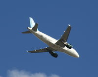 N927FR - Frontier Flip the Dolphin flying over Orlando Executive Airport
