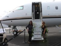 N1RL @ ORL - Two pretty hostesses welcome me aboard a former Indianapolis Speedway CRJ-700