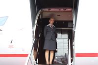 OE-ILI @ ORL - Austrian registered CRJ-200 with pretty blonde hostess from Austria greeting me
