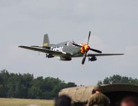N551E @ YIP - Roush's P-51B Old Crow flying low over WWII reinactors