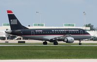 N802MD @ SRQ - US Airways Express E170