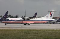 N417AT @ MIA - Eagle ATR-72 getting ready to depart on 8R by photo holes