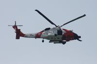 6022 - US Coast Guard flying past Sand Key Park Beach Clearwater FL
