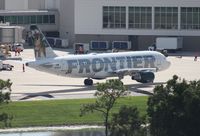 N214FR @ MCO - Frontier Carl the Coyote A320
