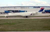 N669CA @ DTW - Comair CRJ-700 from window of Delta 757 on take off run