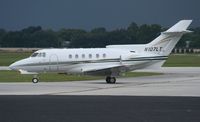 N107LT @ ORL - BAE HS700A with arriving storms