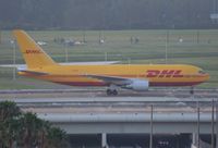 N788AX @ MCO - DHL 767-200 early morning arrival