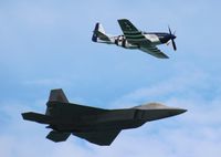 N351DT - Crazy Horse 2 with F-22 over Cocoa Beach