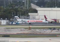 YV1111 @ FLL - Rare in the US, had to shoot bad record shot from across the ramp - Conviasa Venezuela CRJ-700