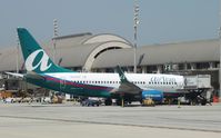 N338AT @ KSNA - Boeing 737-700