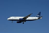 N547JB @ KLAS - Jet Blue, is here approaching Las Vegas Int'l(KLAS) - by A. Gendorf
