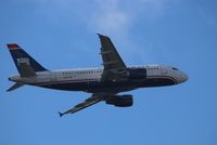 N747UW @ KMCO - Airbus A319