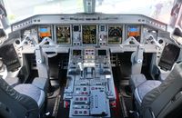 N981EE @ ORL - Lineage 1000 cockpit