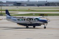 N208EE @ KORD - Cessna 208B
