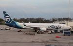 N402AS @ KMCO - Boeing 737-990/ER