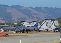 Watsonville Municipal Airport (WVI) - MARINE CORPS RULES - VMA-513 AV-8B+ 165006 WF-01 boss bird; HMM-268 CH-46Es 153318 YQ-01, 156456 YQ-02 and 153368 YQ-10 (on forward mast visible); and tail of Commemorative AF AZ Wing TB-25N N125AZ #18 visible @ 2010 Watsonville fly-in - by Steve Nation