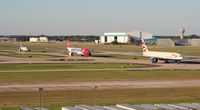 Tampa International Airport (TPA) - Line up of British Airways, Edelweiss and USAirways Carolina Panthers - by Florida Metal